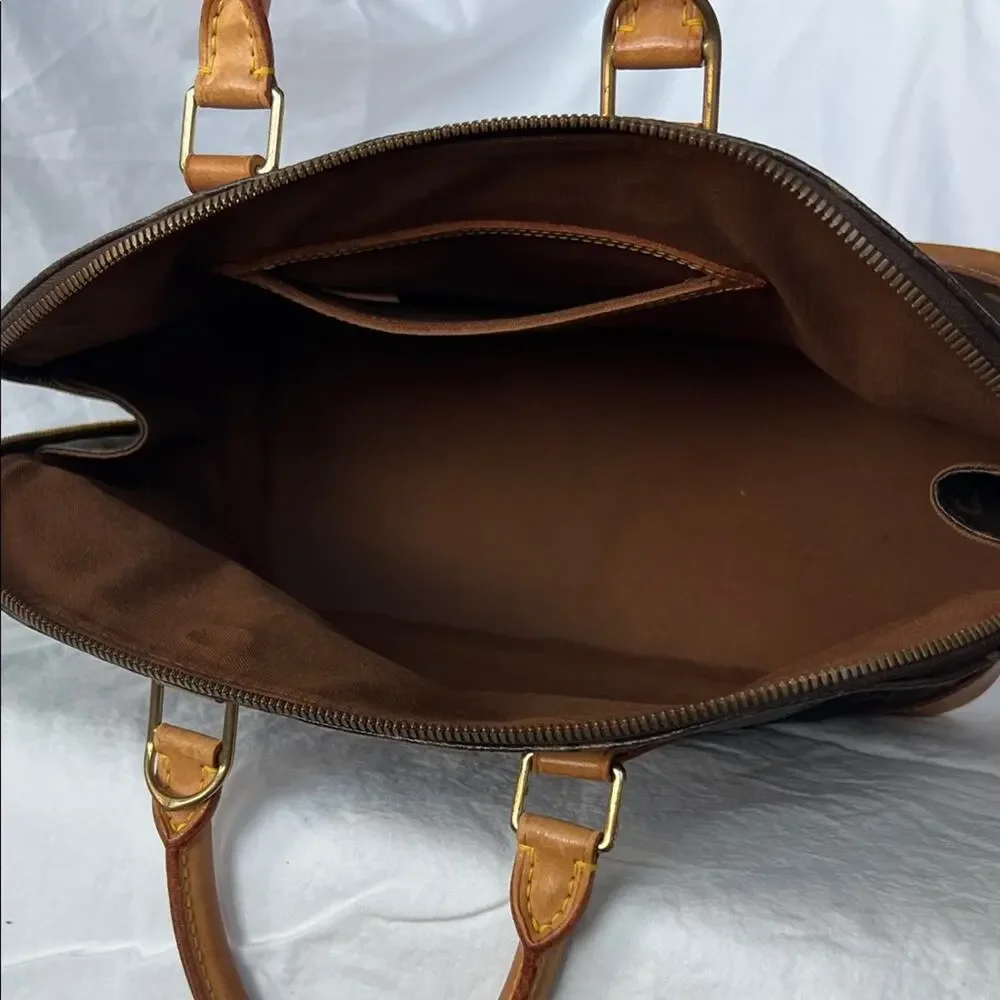 Louis Vuitton Alma PM Monogram Handbag